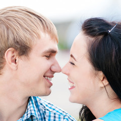 Portrait of a beautiful young happy smiling couple