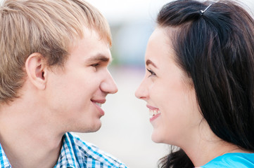 Portrait of a beautiful young happy smiling couple