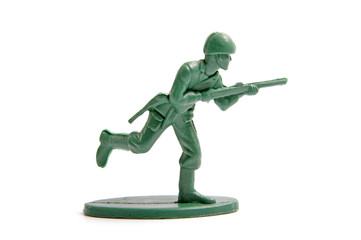 green toy soldiers on white background - Powered by Adobe