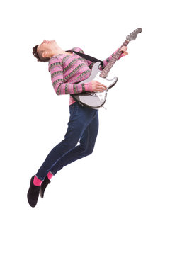 passionate guitarist jumps in the air