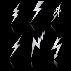 Silver Lightning symbol set on black with reflection.