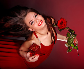 Young woman with flower.