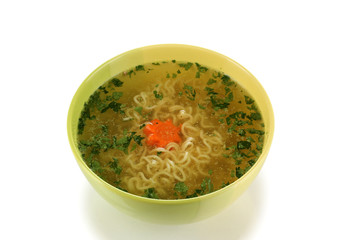 Tasty chicken stock with noodles isolated on white