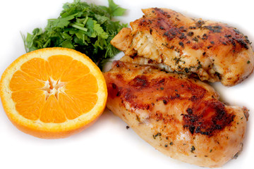 seasoned roast chicken with orange and green