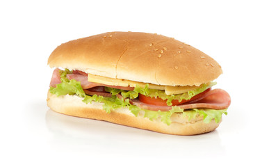half of long baguette sandwich with lettuce, tomatoes, and ham