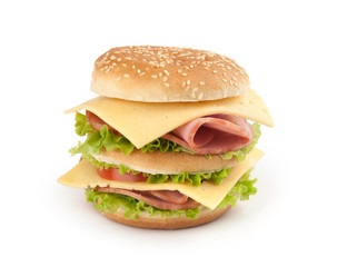 sandwich with ham,cheese and vegetables on white background