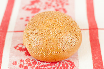 Appetizing bun with sesame seeds
