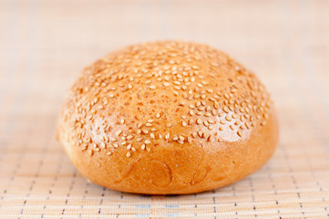 Appetizing bun with sesame seeds