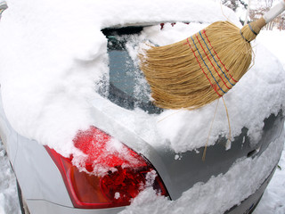 Removing snow from car