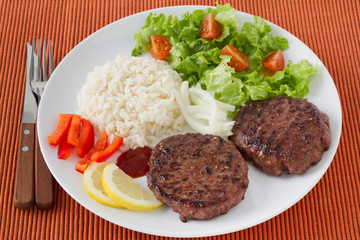 grilled hamburgers with boiled rice and salad