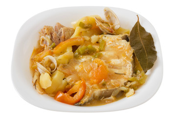 fish stew in the white plate