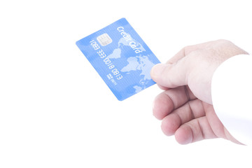 Nameless credit card with chip in a male hand isolated on white