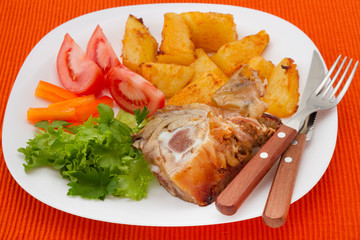 pork with potato and salad
