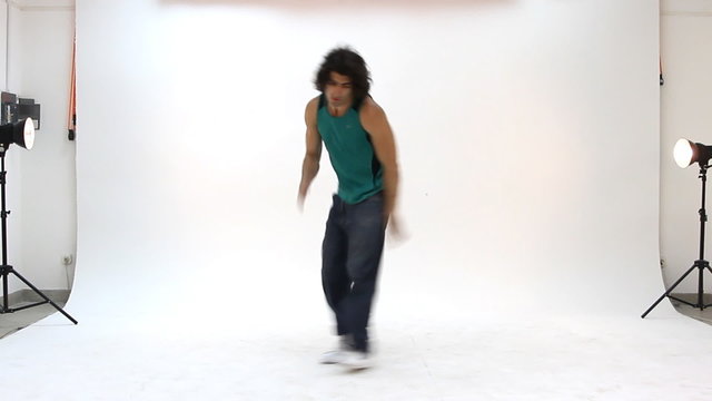 Teenager dancing breakdance in action