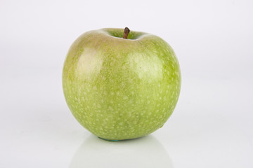 Fresh Juicy Green Apple on white