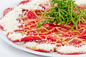 Meat (beef) Carpaccio with Parmesan Cheese and ruccola