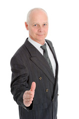 Geschäftsmann reicht die Hand