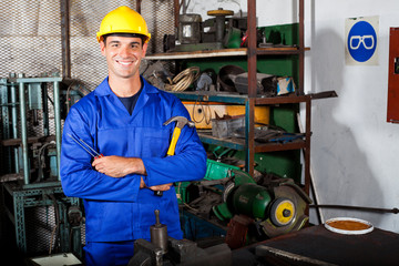 portrait of industrial repairman in workshop