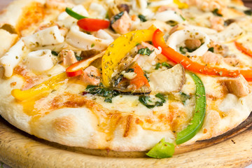 Closeup delicious pizza with seafood