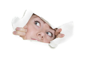 woman peeping through hole in paper