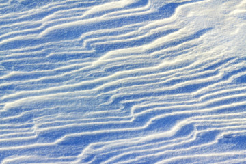 snow drifts in the morning light