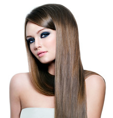 Fototapeta premium Portrait of beautiful woman with long straight hair