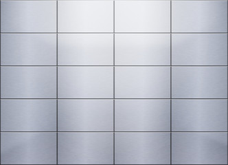 Brushed metal tiled panels at the wall