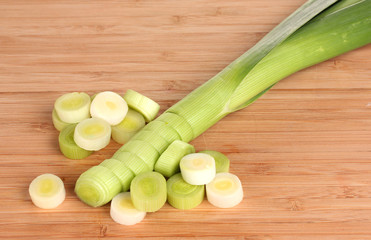 sliced ​​leek on wooden background