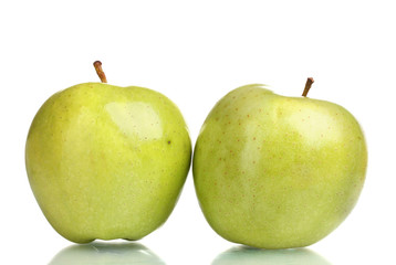 two juicy green apples isolated on white
