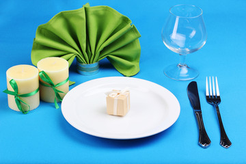 Table setting on blue background