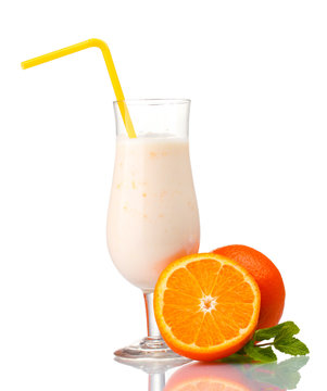 Bunch of bananas and milk cocktail isolated on white