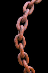 Huge chain made of steel isolated on the black background
