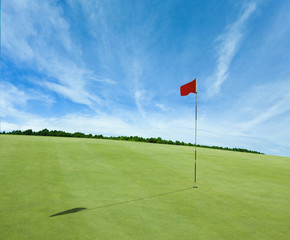 Obraz premium Flag and the golf field