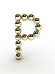 3d alphabet of gold beads.