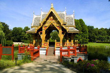 The Asian pagoda against lake and wood