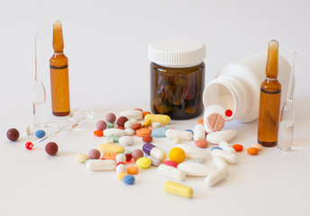 Multi-colored pills on the table