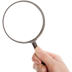 Hand holding magnifying glass
