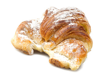 Fresh and tasty croissant on the white