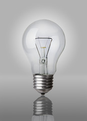 Classic Light bulb turned off isolated on gray