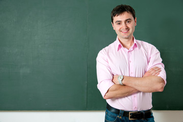 student or teacher at the blackboard