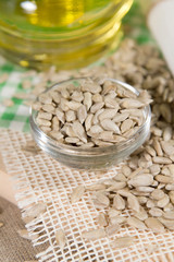 Sunflower oil and seeds on sacking