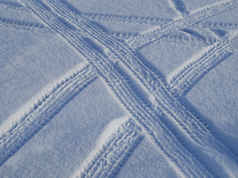 Car Tracks On The Snow