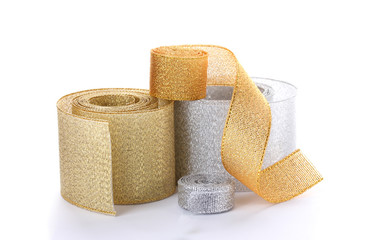beautiful golden and silver ribbons isolated on white