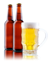 Beer mug and bottle isolated on white background