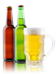 Beer mug and bottle isolated on white background
