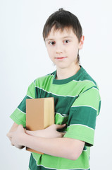 A boy holding a book