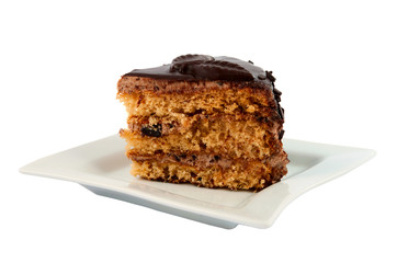 piece of chocolate cake on a plate isolated
