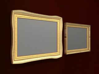 Golden Picture Frames on dark wall