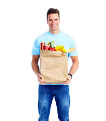 Young man with a grocery shopping bag.