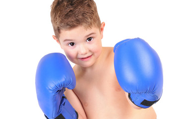 little boy with boxing gloves